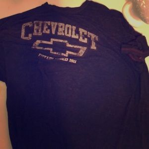 A tee shirt with the Chevrolet emblem.